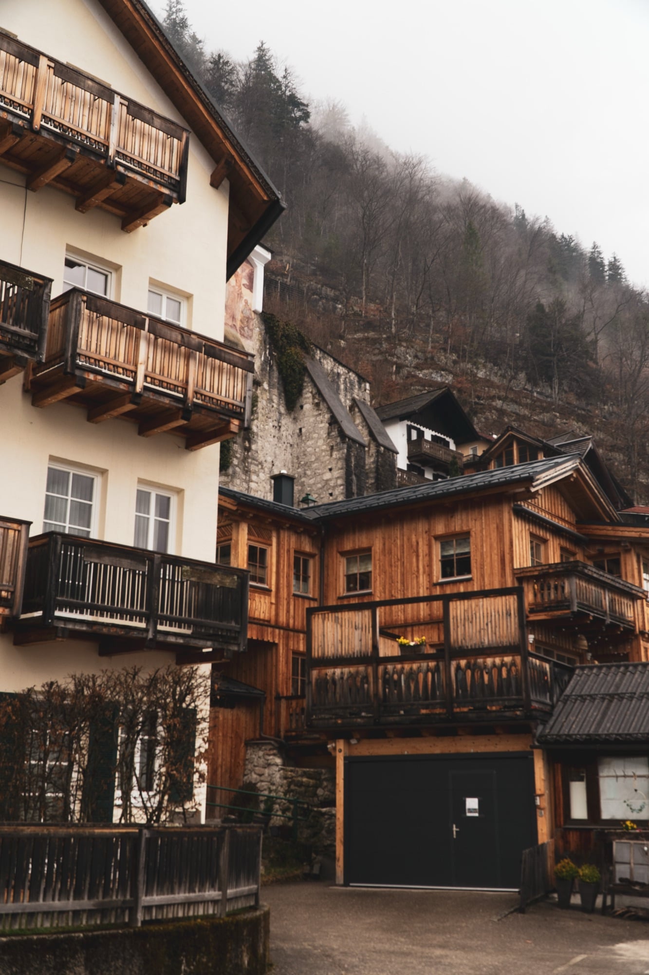 Timber balconies of the chalets stacked on the hillside, Hallstatt