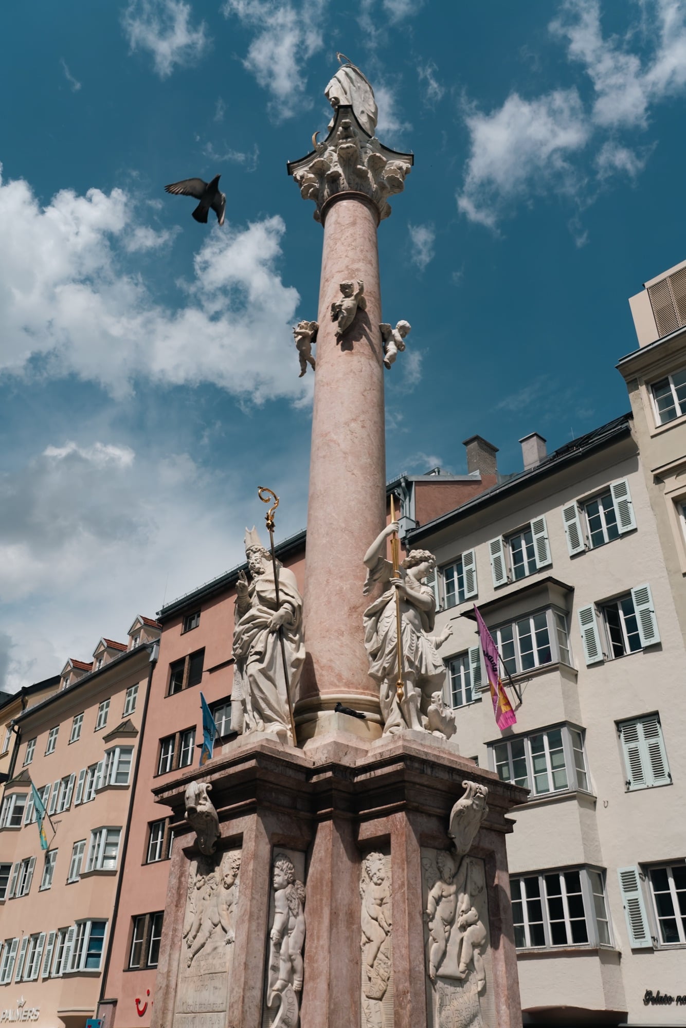 The Annasaeule column topped by its statue above the street, Innsbruck