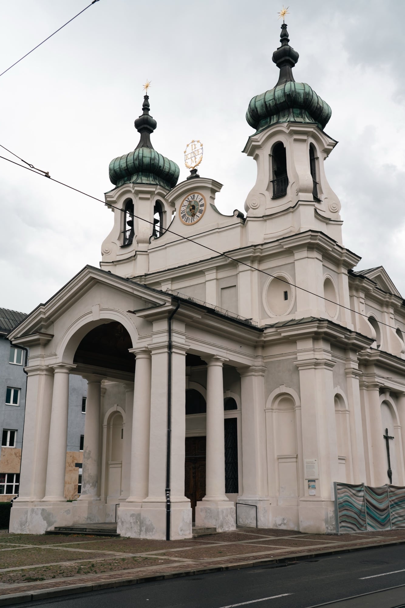 The twin onion-domed towers of a Baroque church, Innsbruck