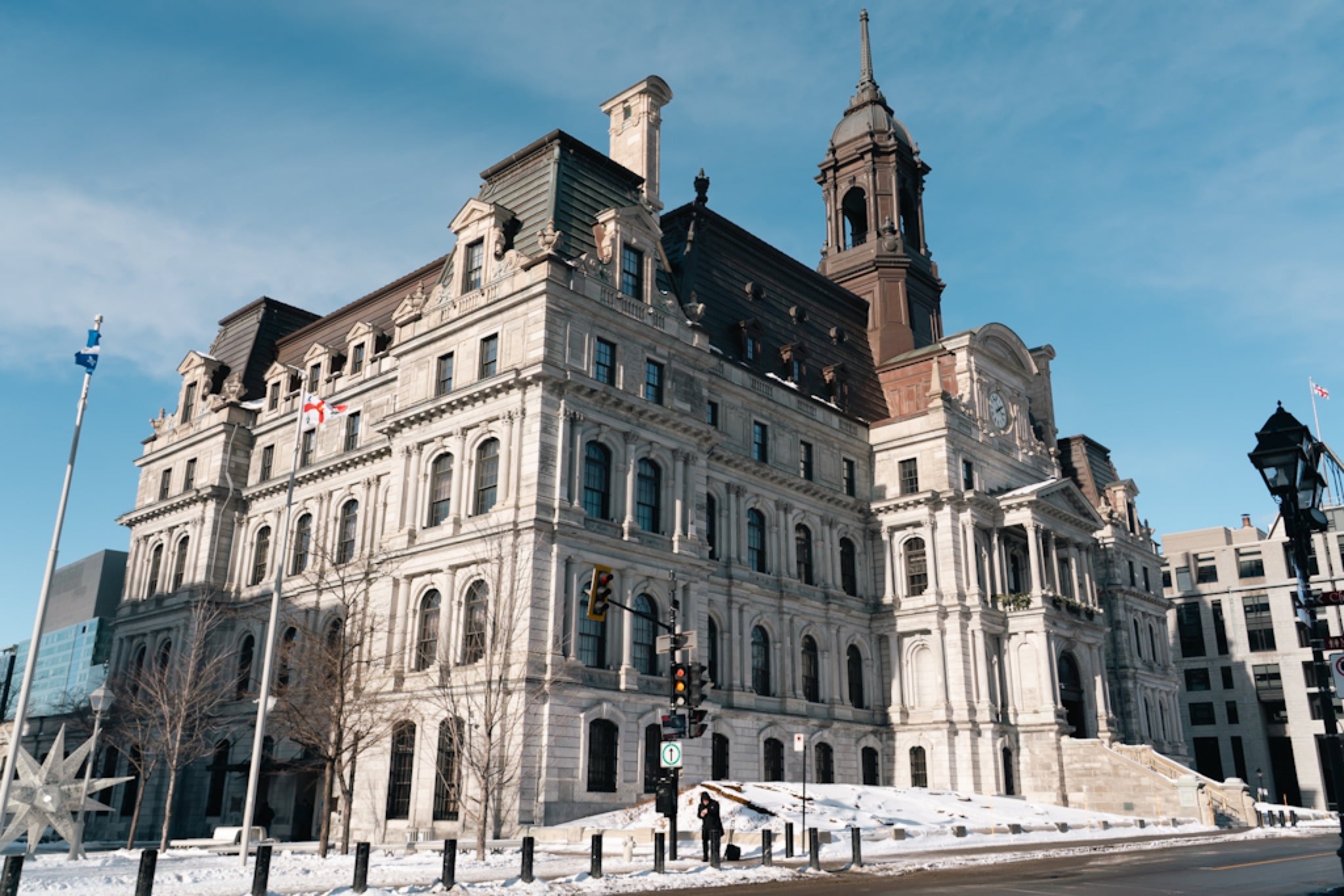Montreal City Hall on its corner under a bright winter sky