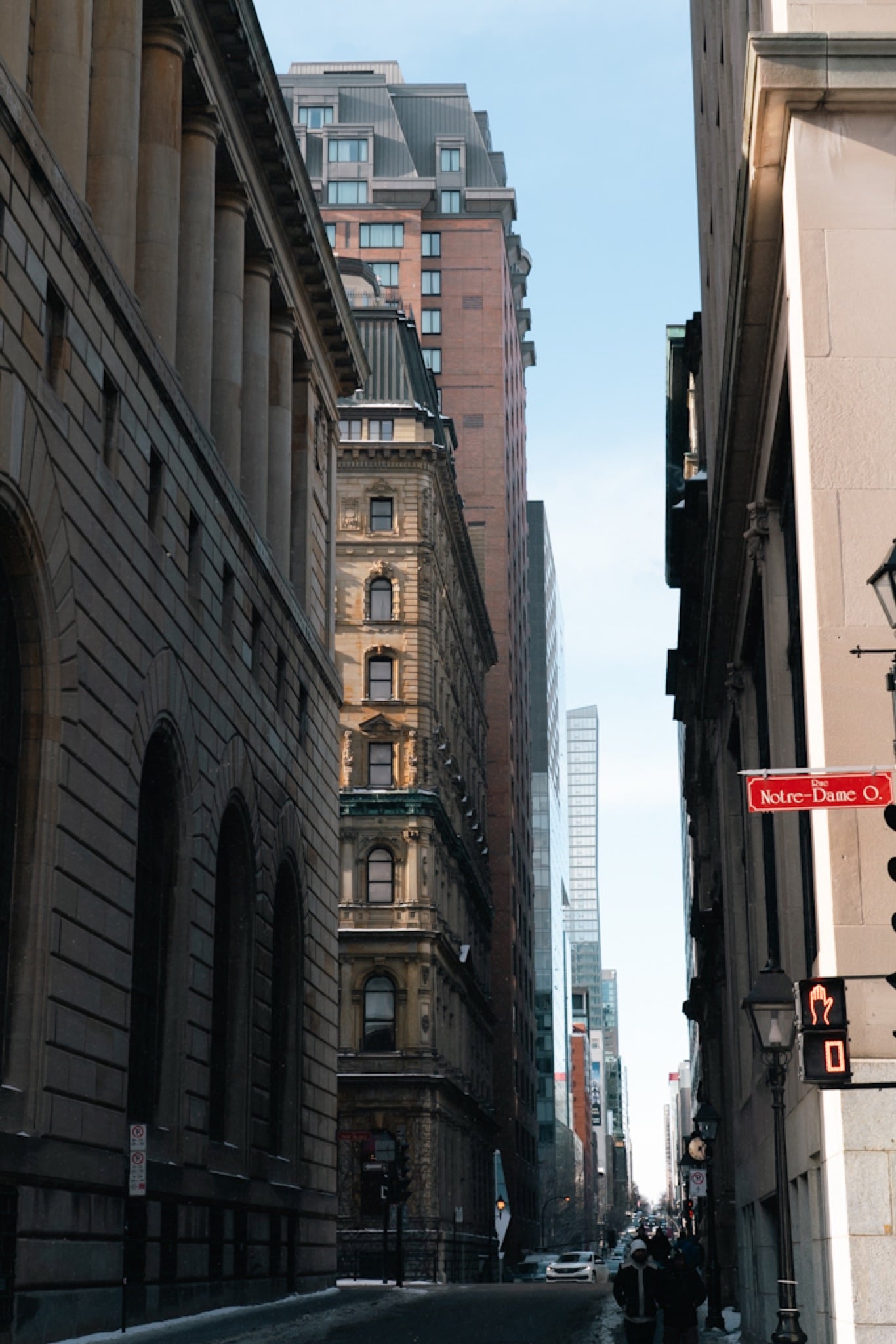 Downtown towers rising over a quiet street