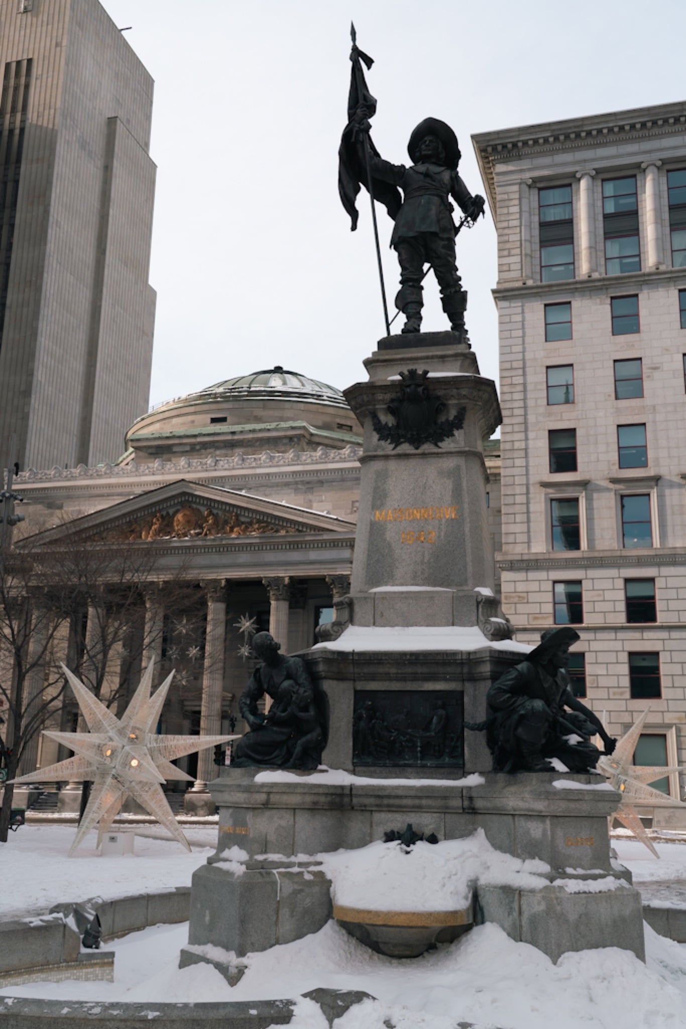 The Maisonneuve Monument before the Bank of Montreal on Place d'Armes
