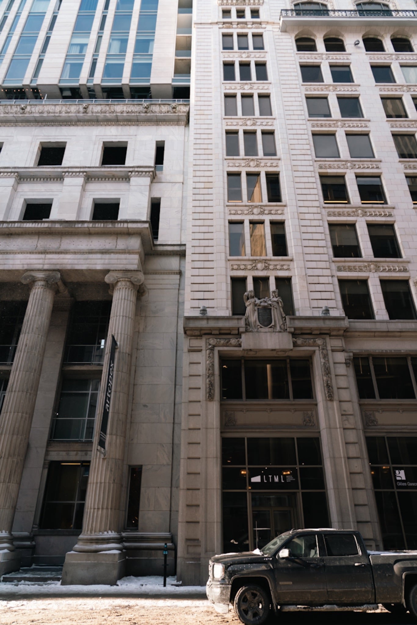 The columned stone façade of an Old Montreal bank