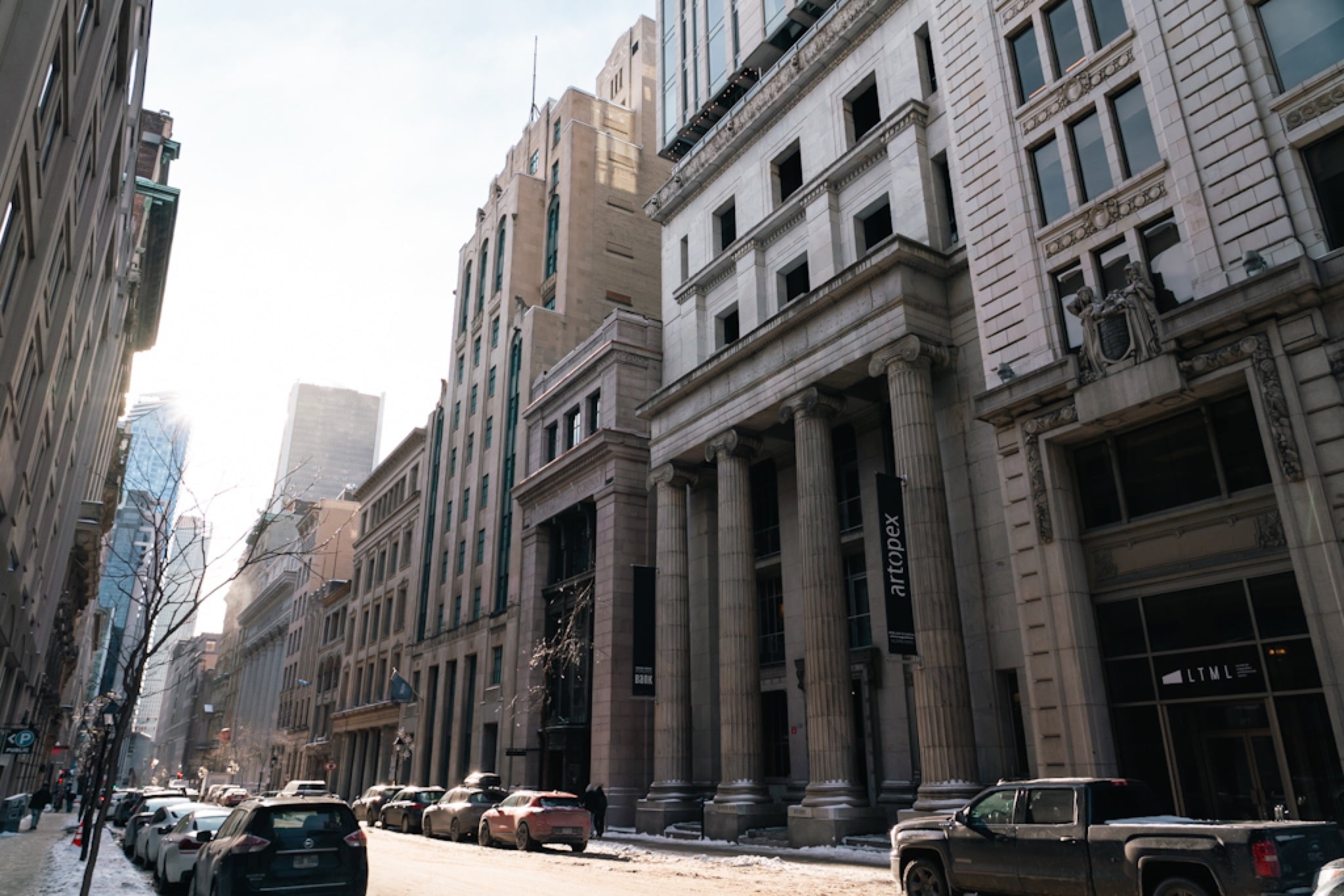 The canyon of a downtown street where old meets new
