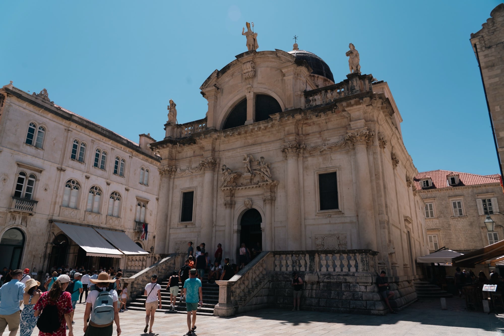 The Baroque facade of the Church of St. Blaise above its busy square, Dubrovnik