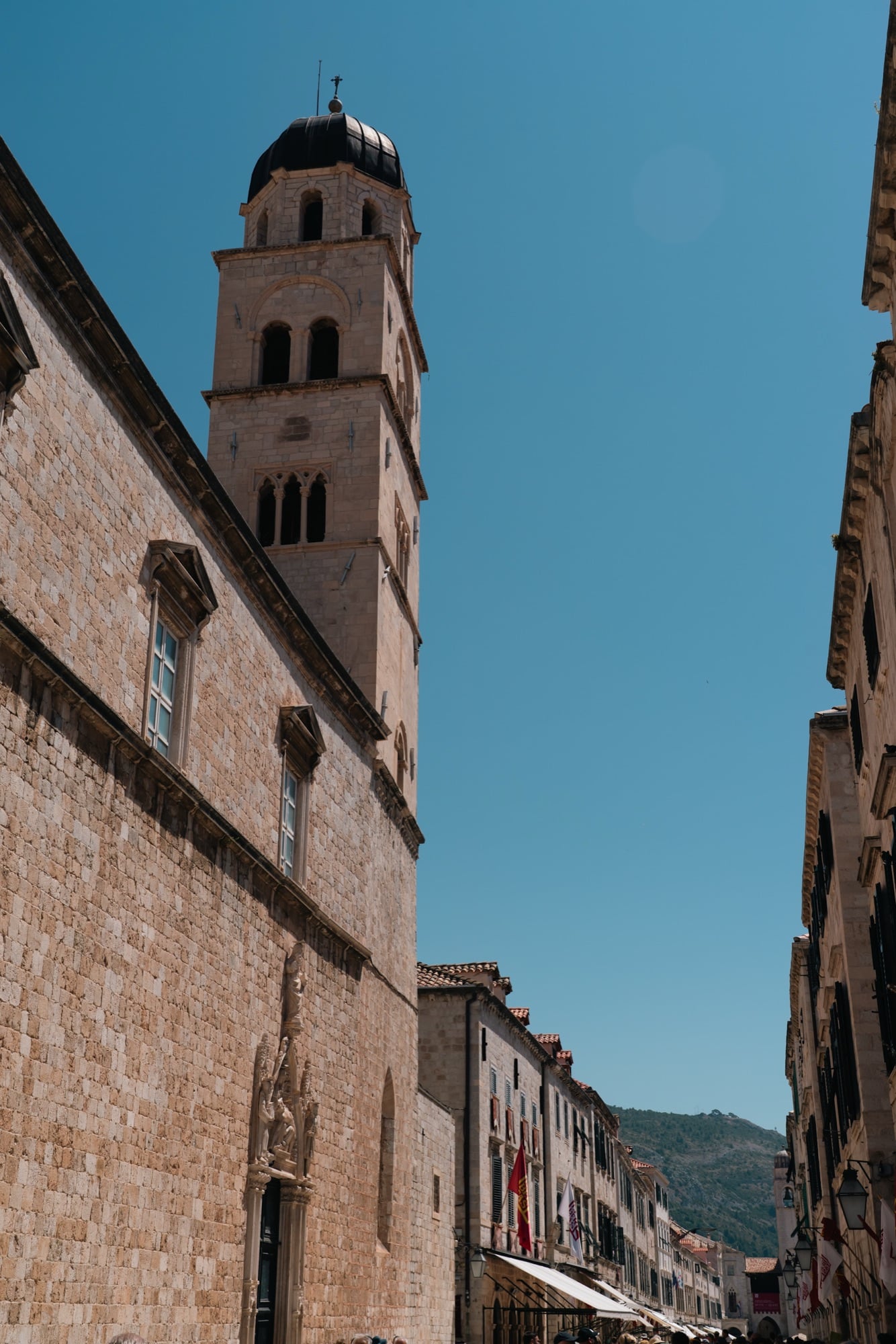 The Franciscan bell tower above a narrow lane running down toward the sea, Dubrovnik