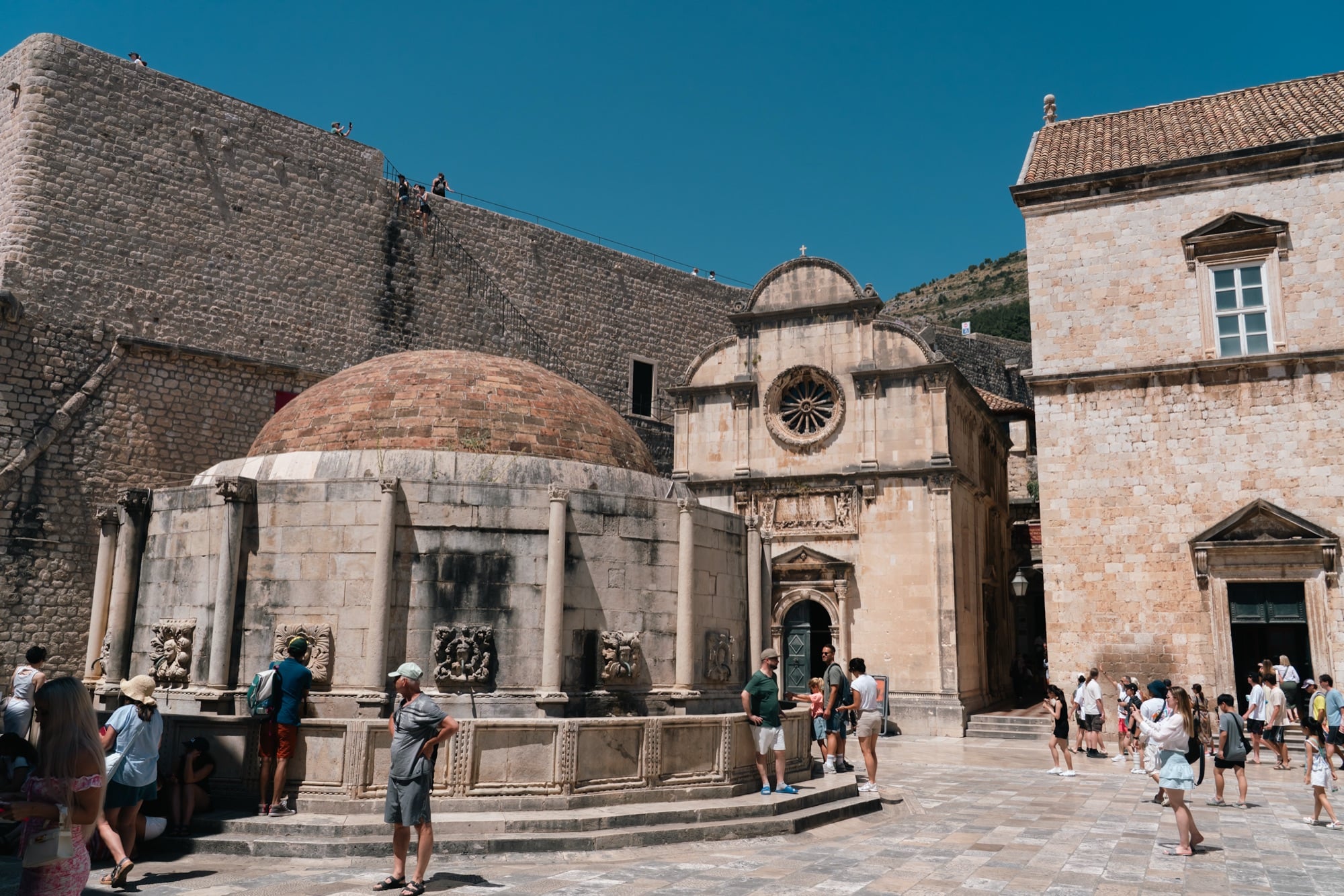 Onofrio's Fountain and the domed church on the square inside the Pile Gate, Dubrovnik