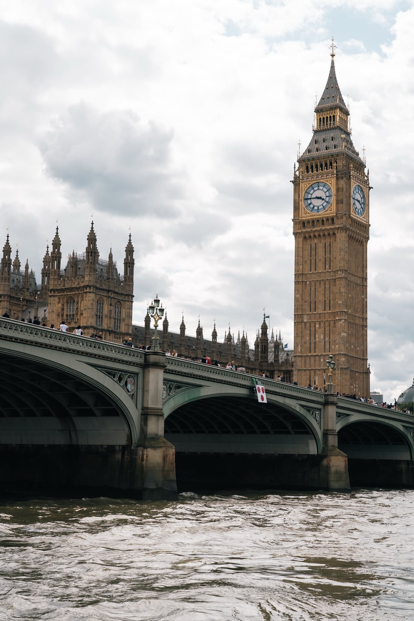 Big Ben and the Houses of Parliament beyond Westminster Bridge across the Thames