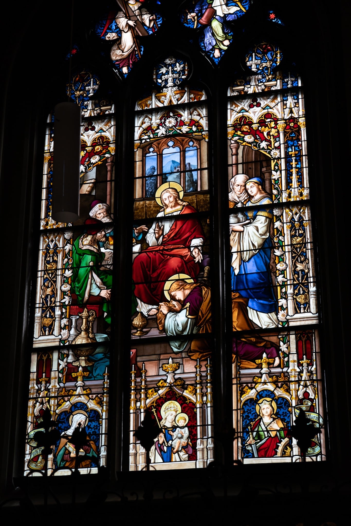 A jewel-toned stained-glass window inside the Konstanz Minster