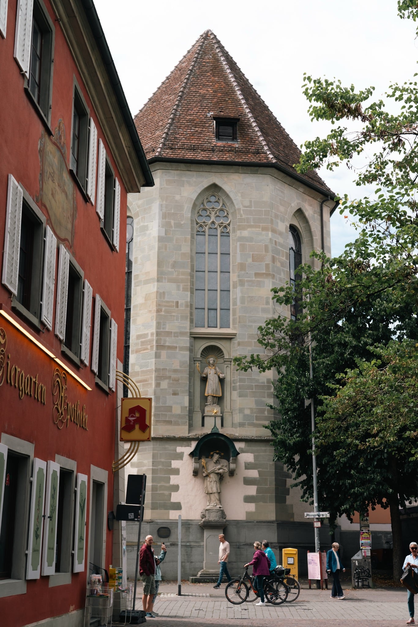 The octagonal chancel and spire of St. Stephen's Church above a Konstanz street corner