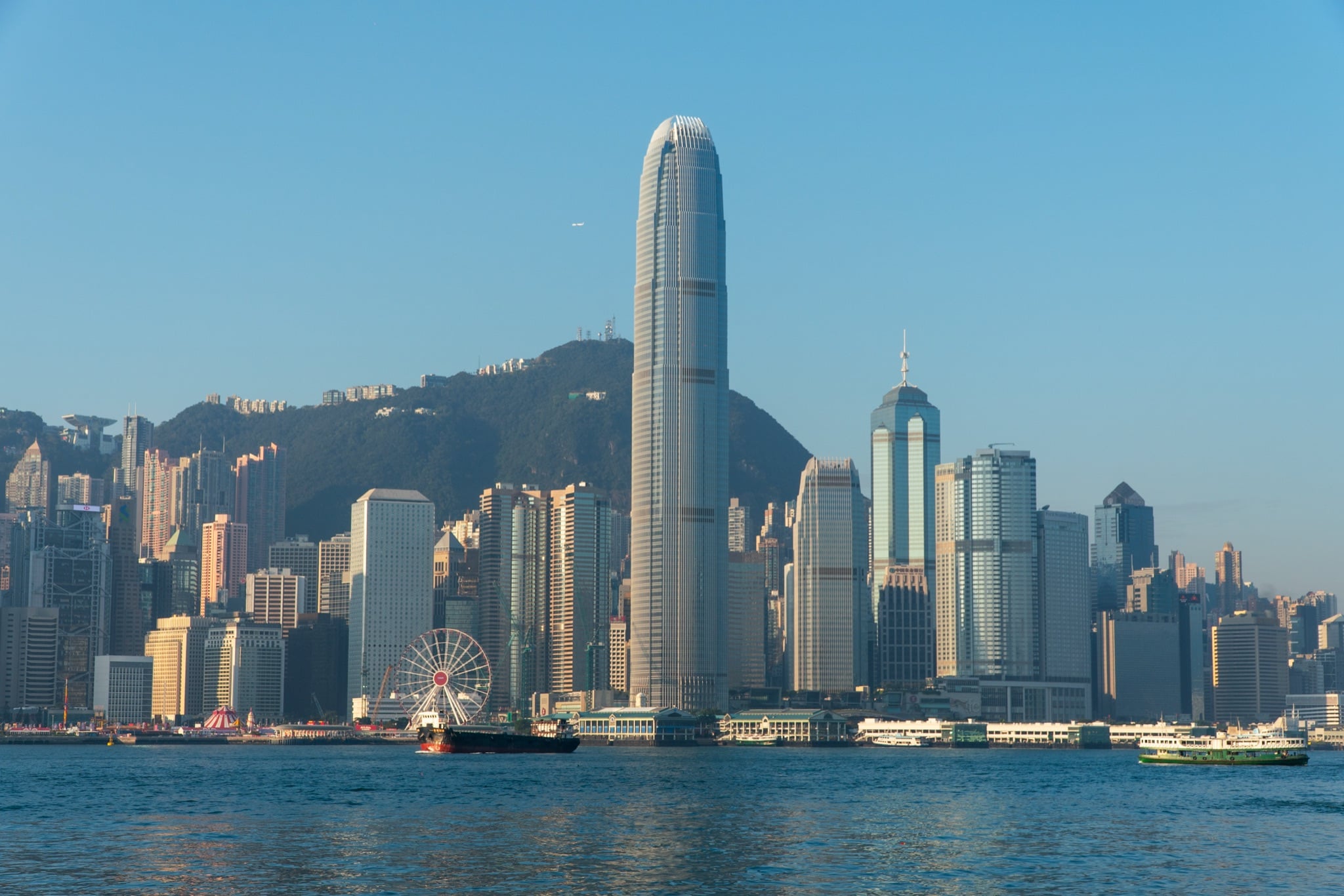 Hong Kong skyline rising over Victoria Harbour