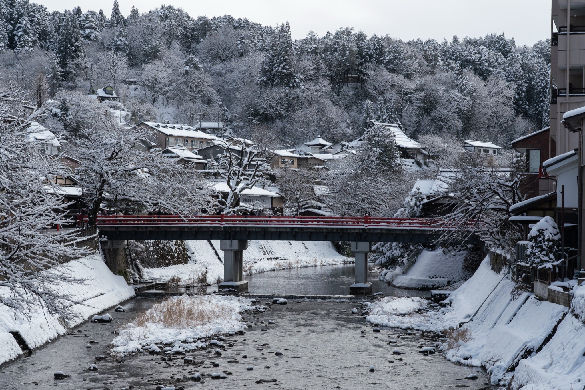 Snowfall over the Miyagawa at Takayama