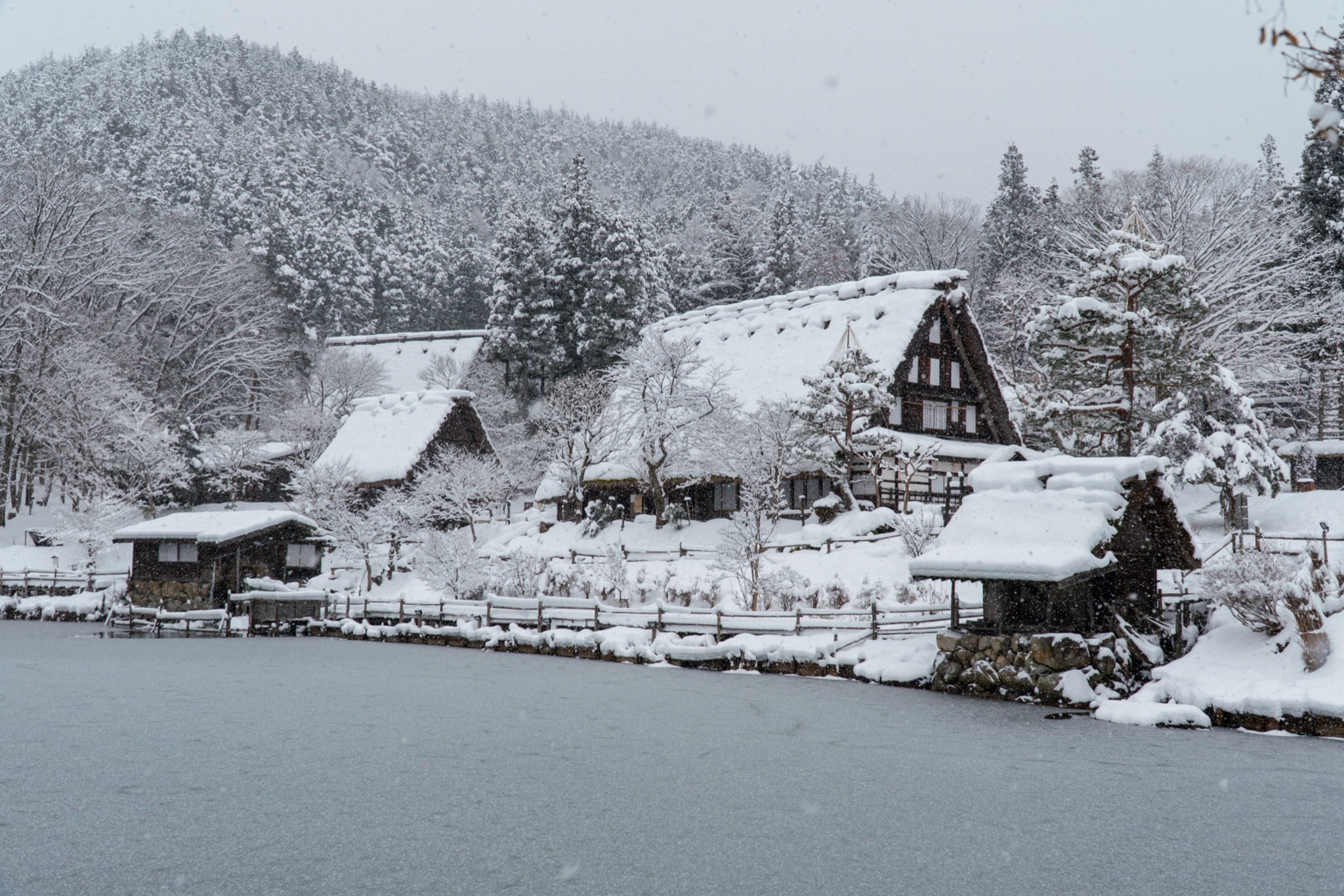 Snow settling on a Takayama side street