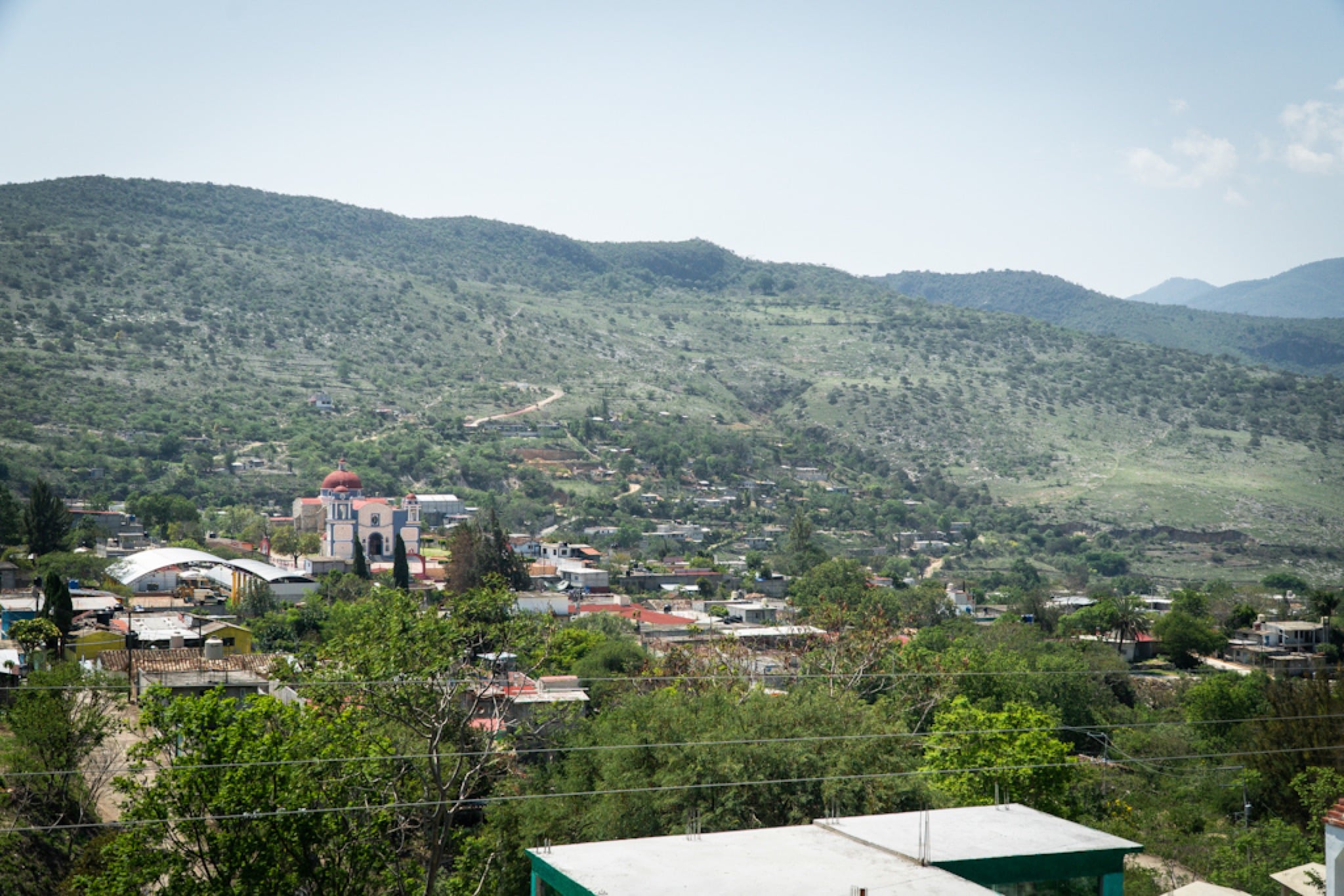 A valley town scattered below the Oaxacan sierra