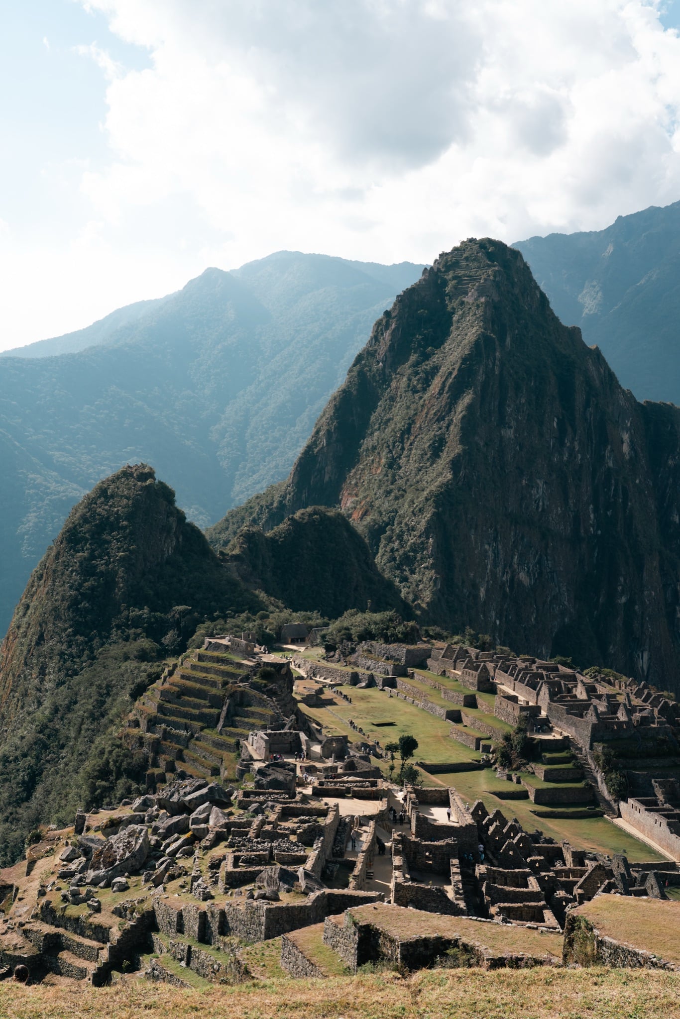 The citadel and Huayna Picchu beneath a heavy cloud bank