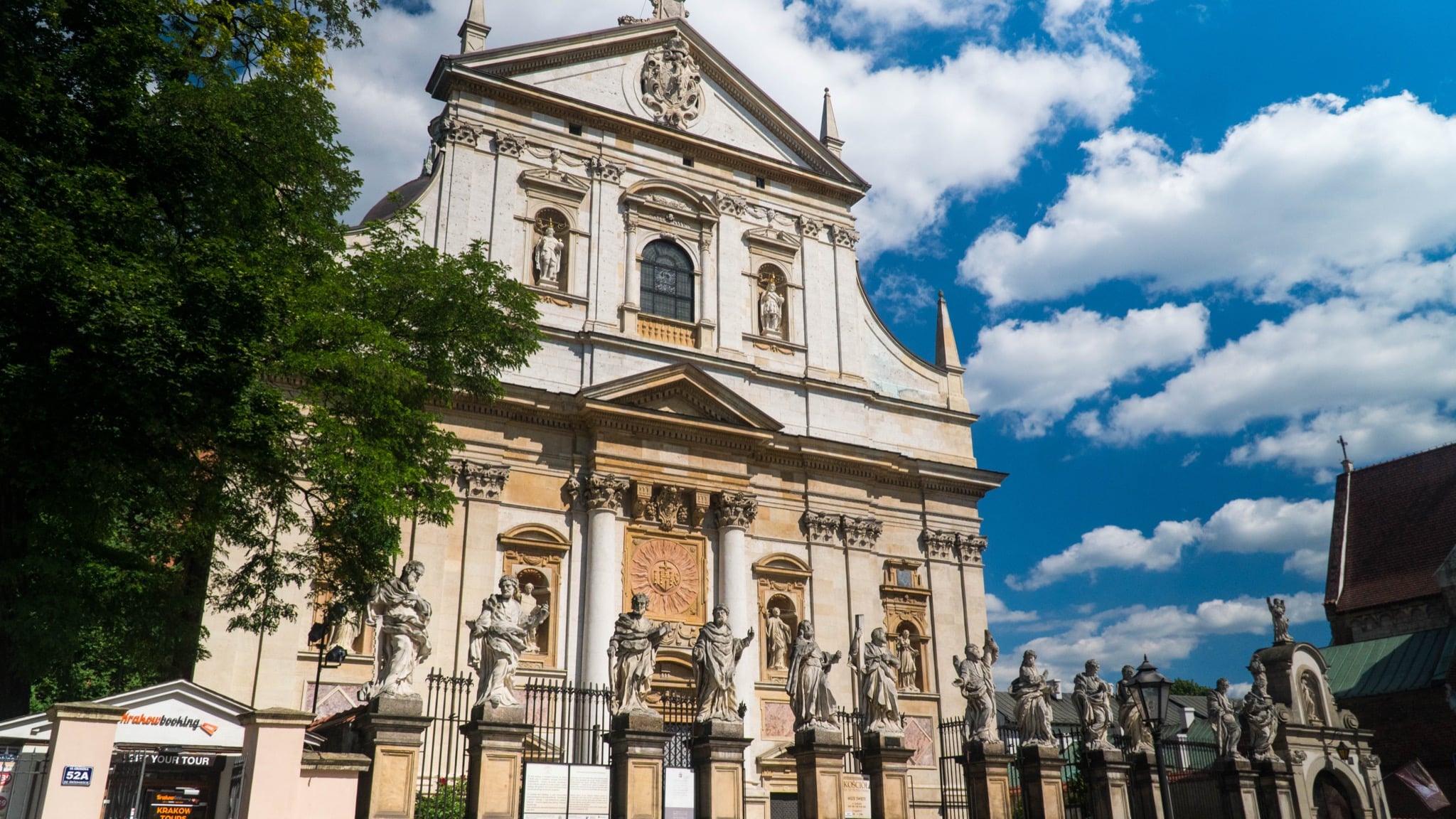 The Baroque facade of the Church of Saints Peter and Paul with its row of apostle statues
