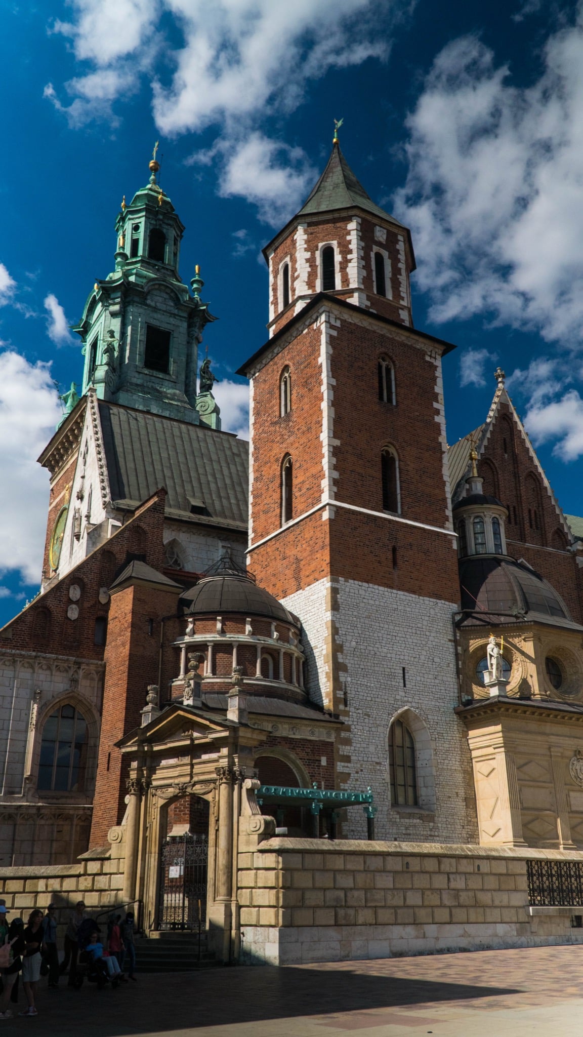 The clustered spires and towers of Wawel Cathedral against the sky