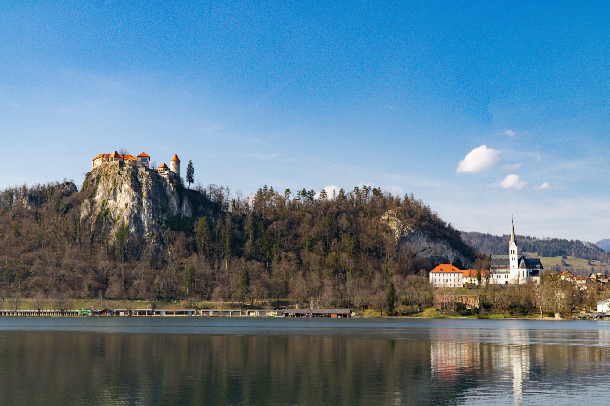 Bled Castle perched on its cliff above the lake, the island church beyond