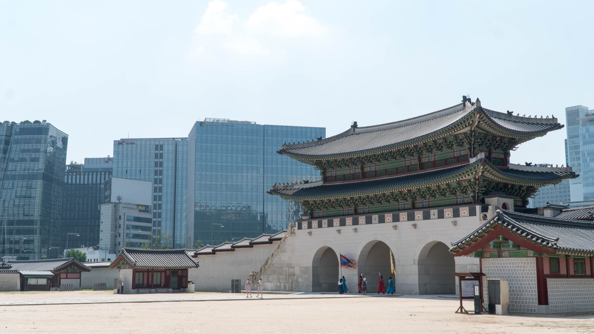 The wide courtyard of Gyeongbokgung Palace beneath the mountains, Seoul