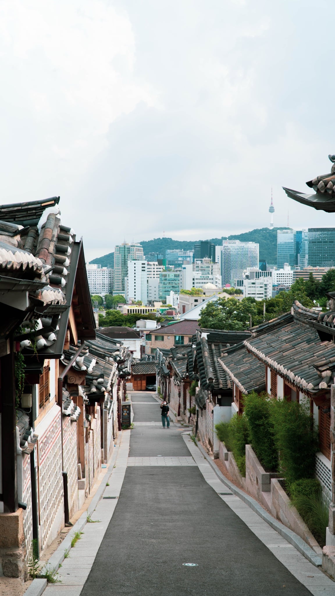 Houses stacked up a Seoul hillside