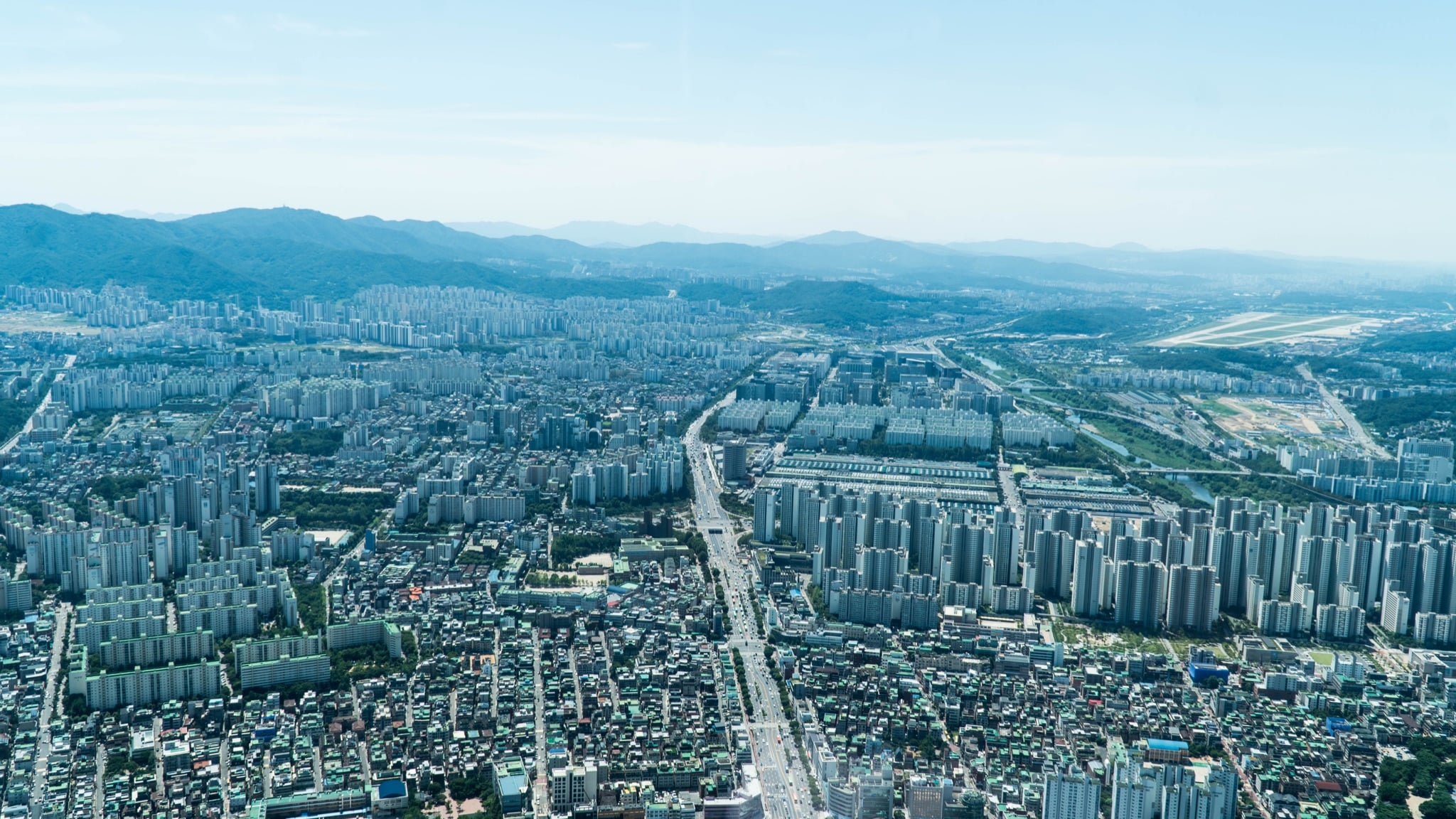 The Seoul skyline under an open sky