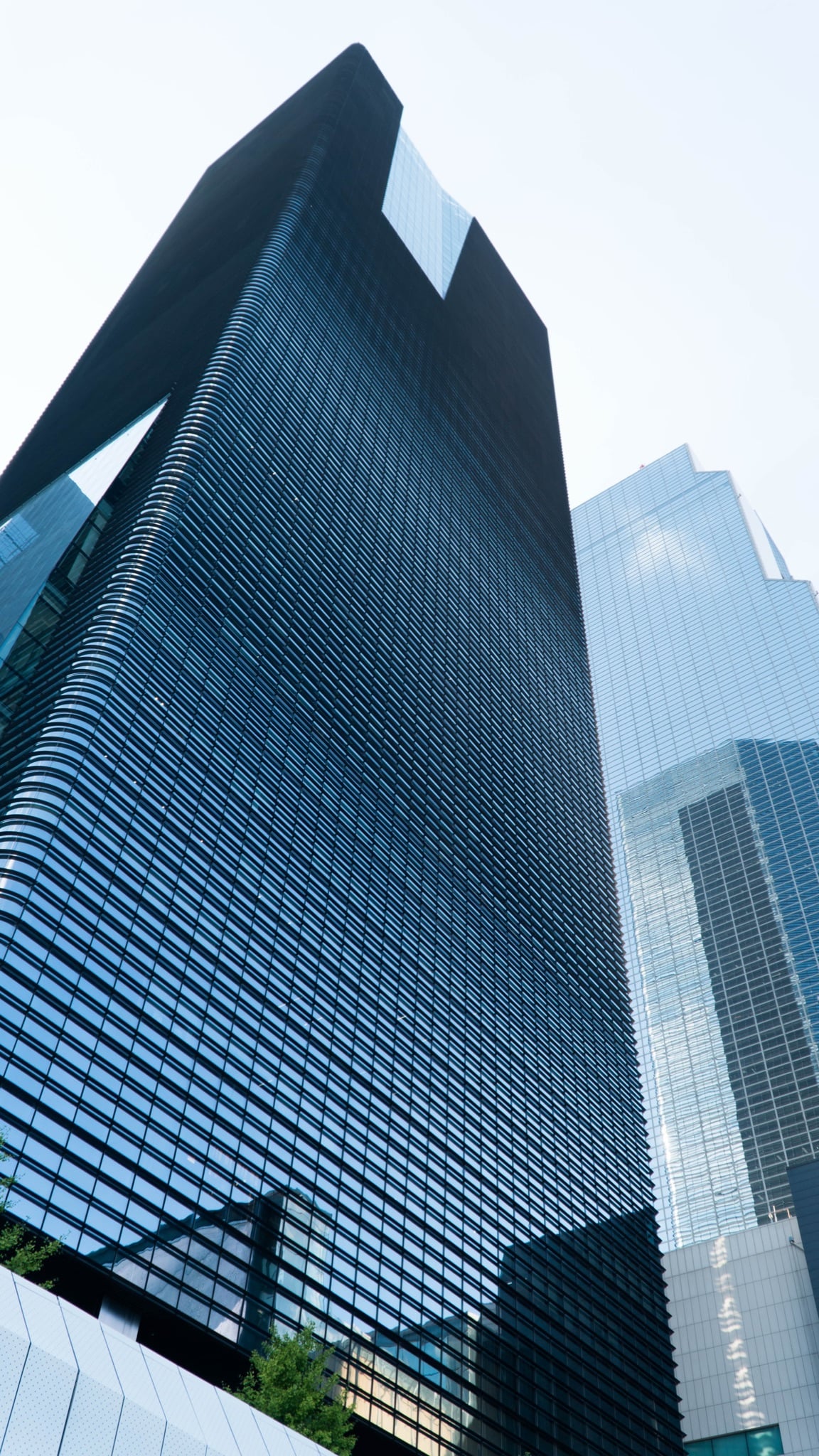 A glass tower climbing into the Seoul sky