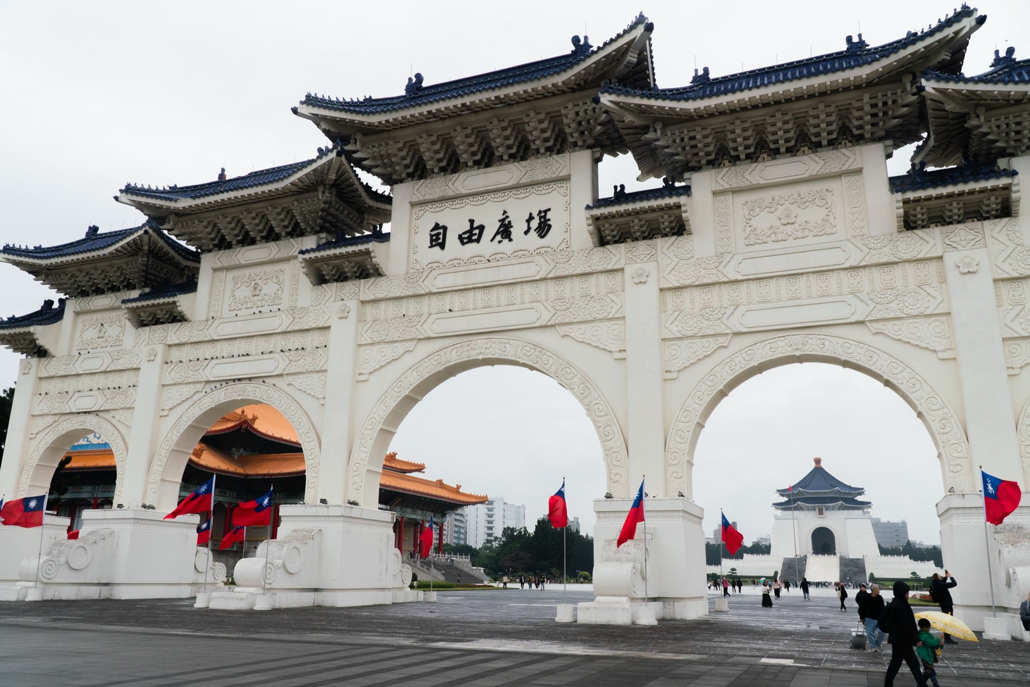 The white marble hall of the Chiang Kai-shek Memorial beneath its blue roof, Taipei