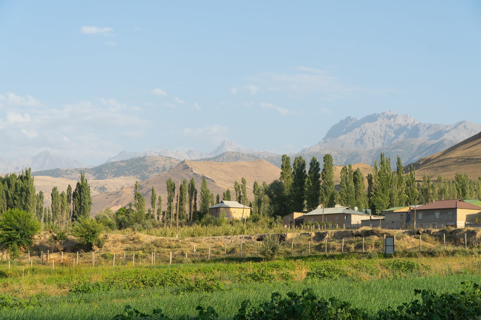 Farmland framed by dry mountains, Dashtikozy