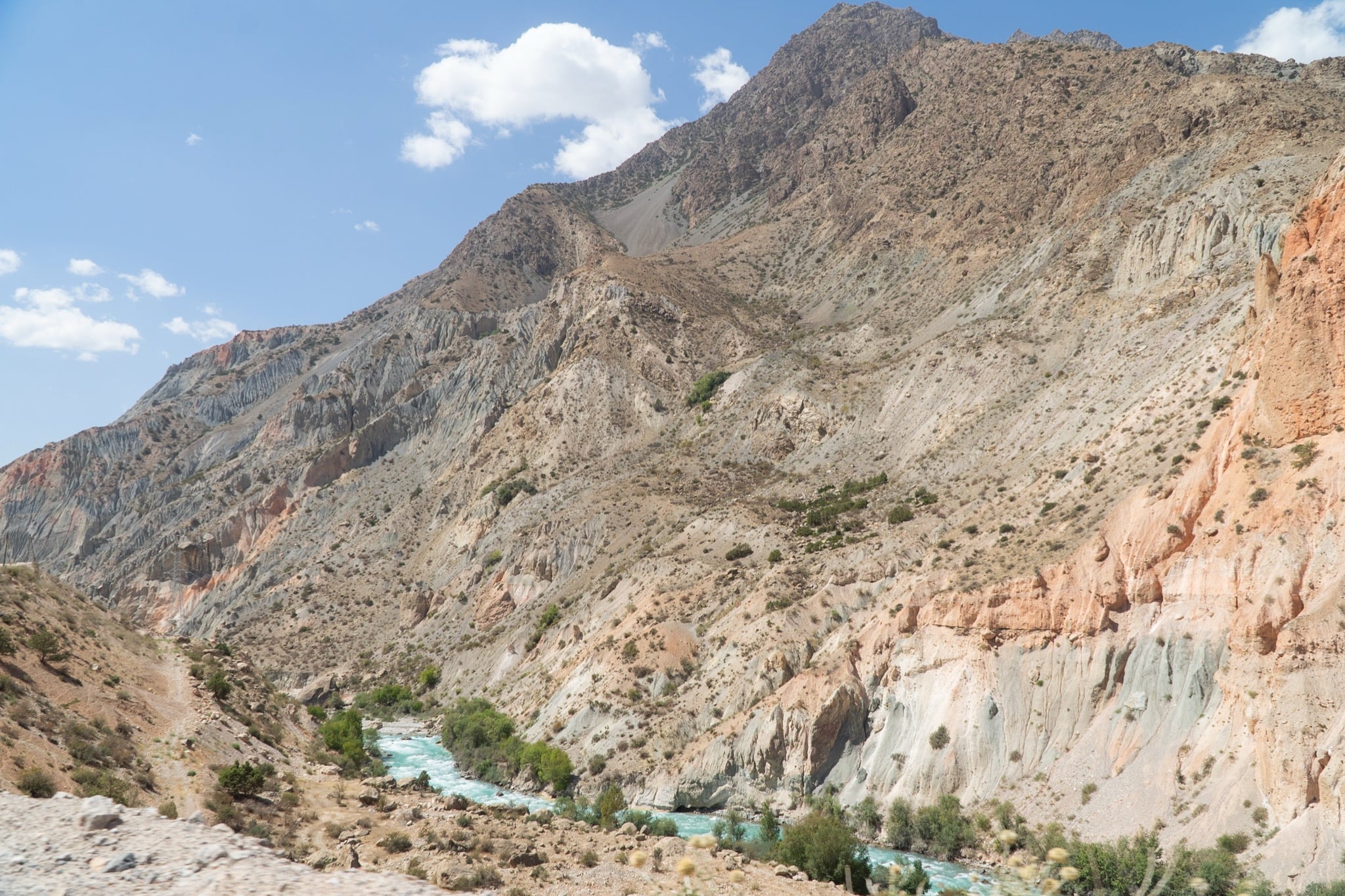 The Fann Mountains rolling toward the horizon