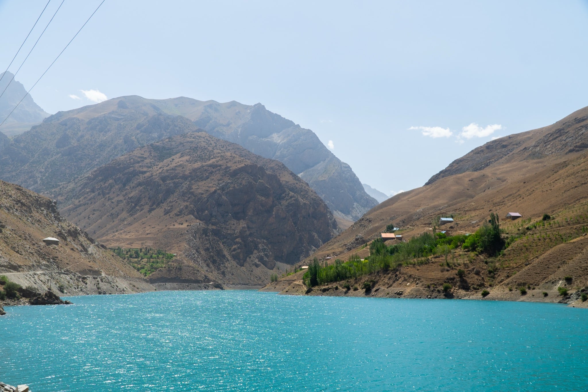 A lake mirroring the mountains at Haft Kul