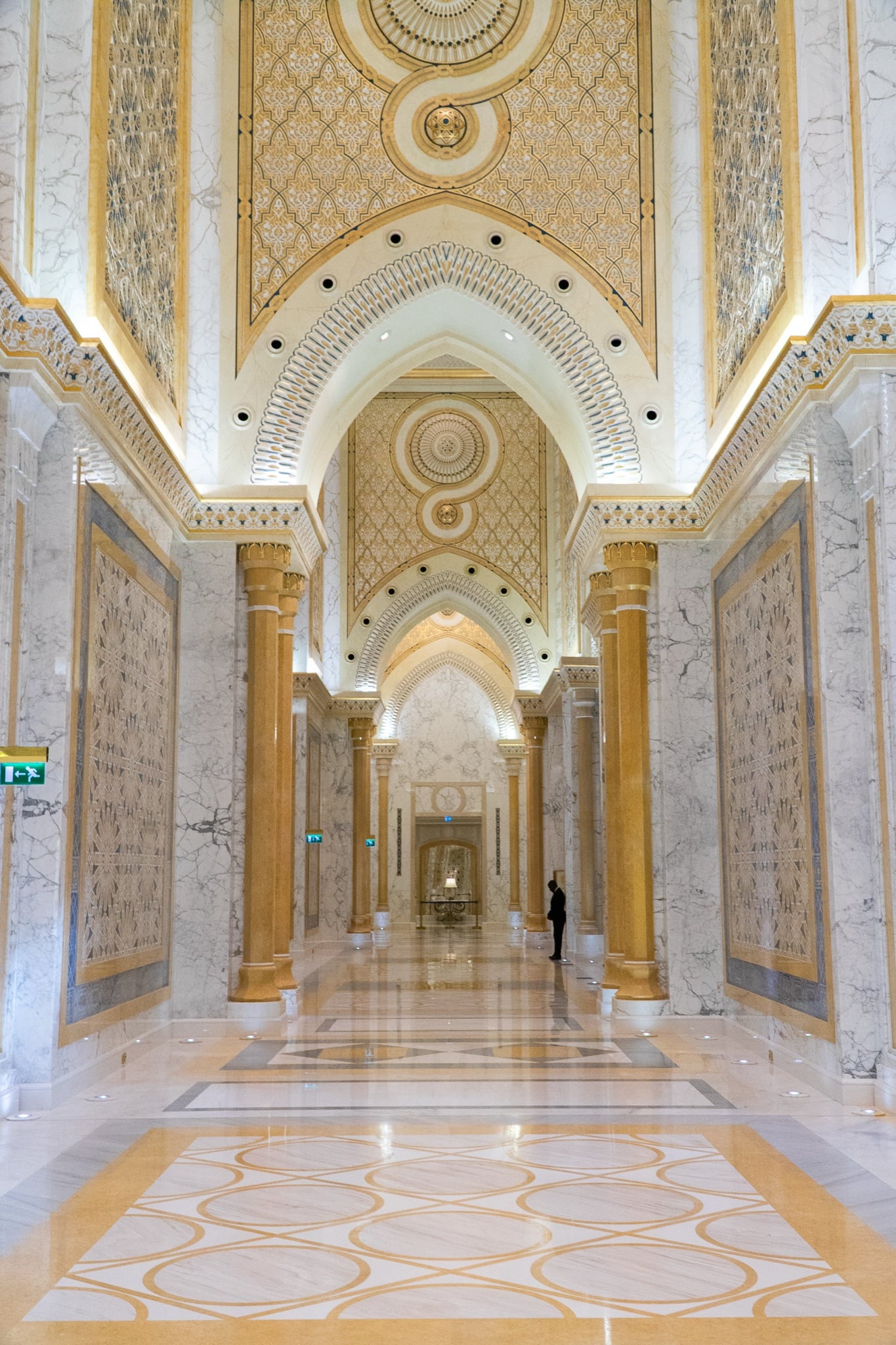 A towering gilded archway in the presidential palace