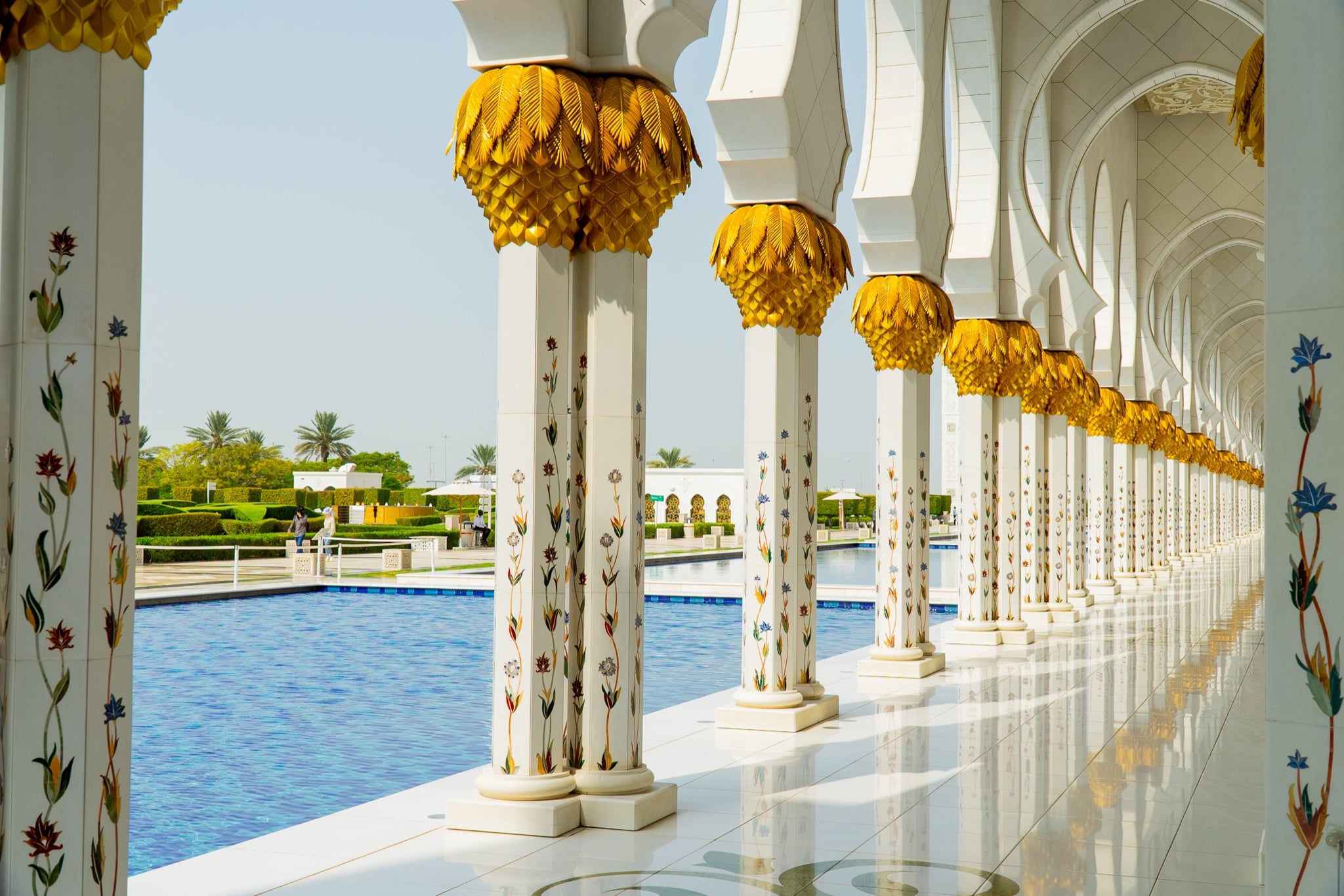 The full range of white domes across the mosque's main courtyard