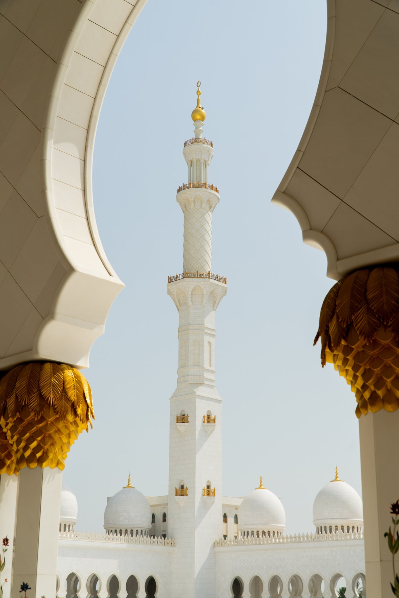 Gilded detailing atop the mosque's courtyard columns