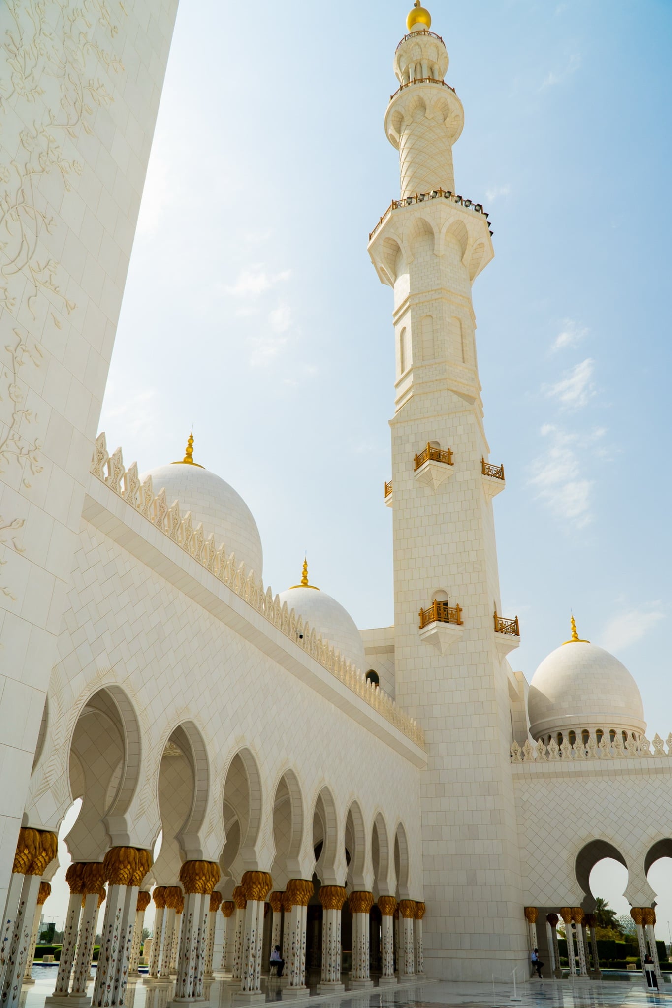 The mosque's domes mirrored in the polished marble floor