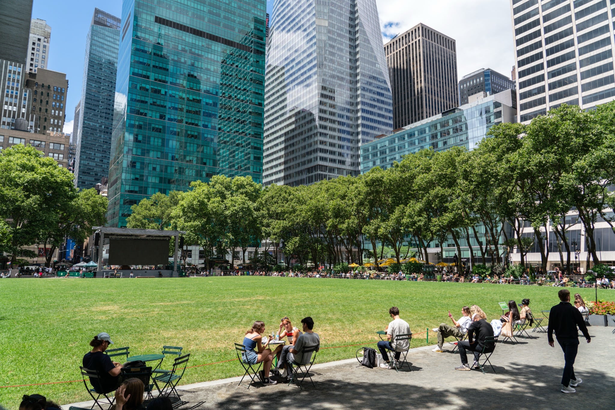 Bryant Park's green lawn ringed by towers