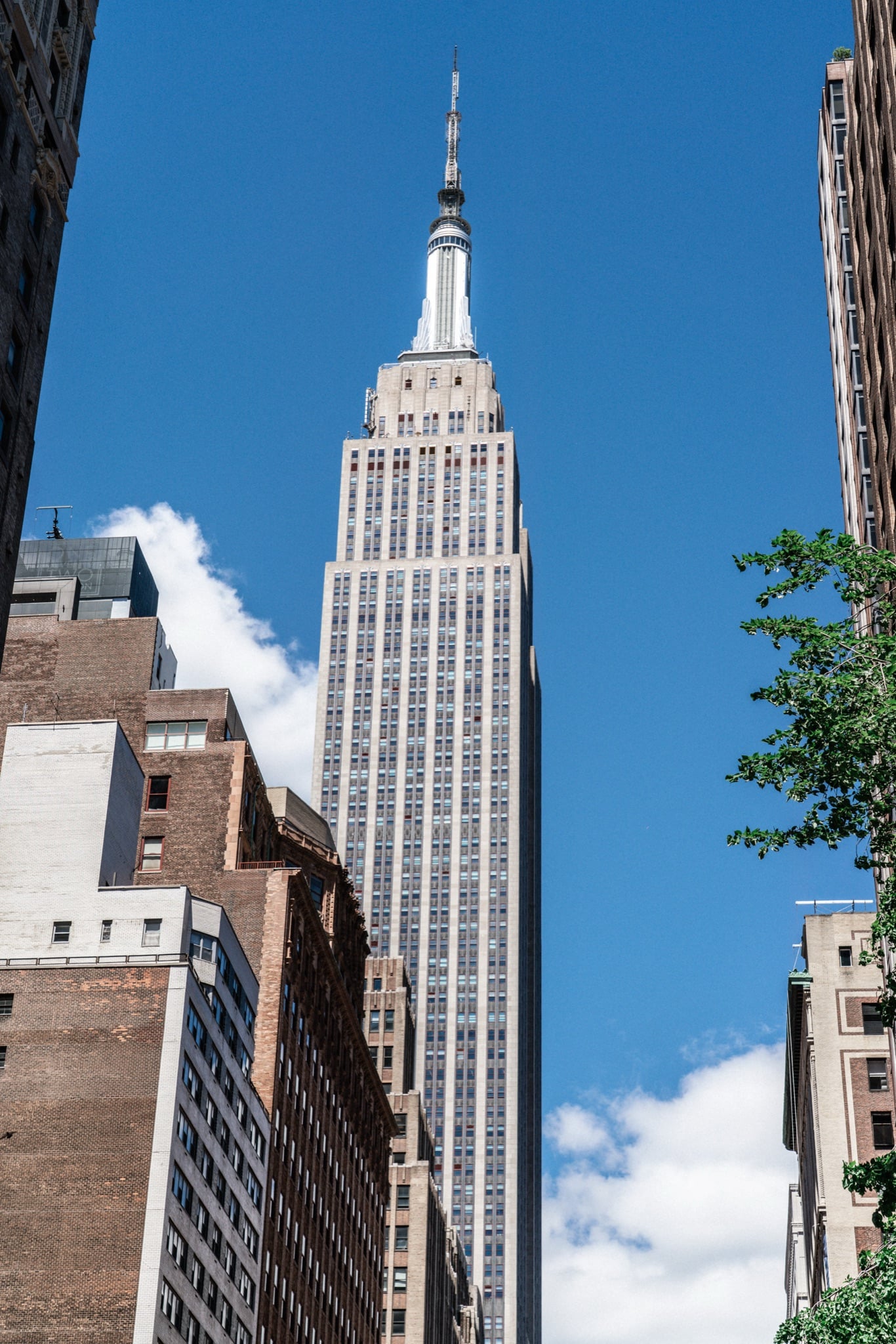 The Empire State Building framed between towers