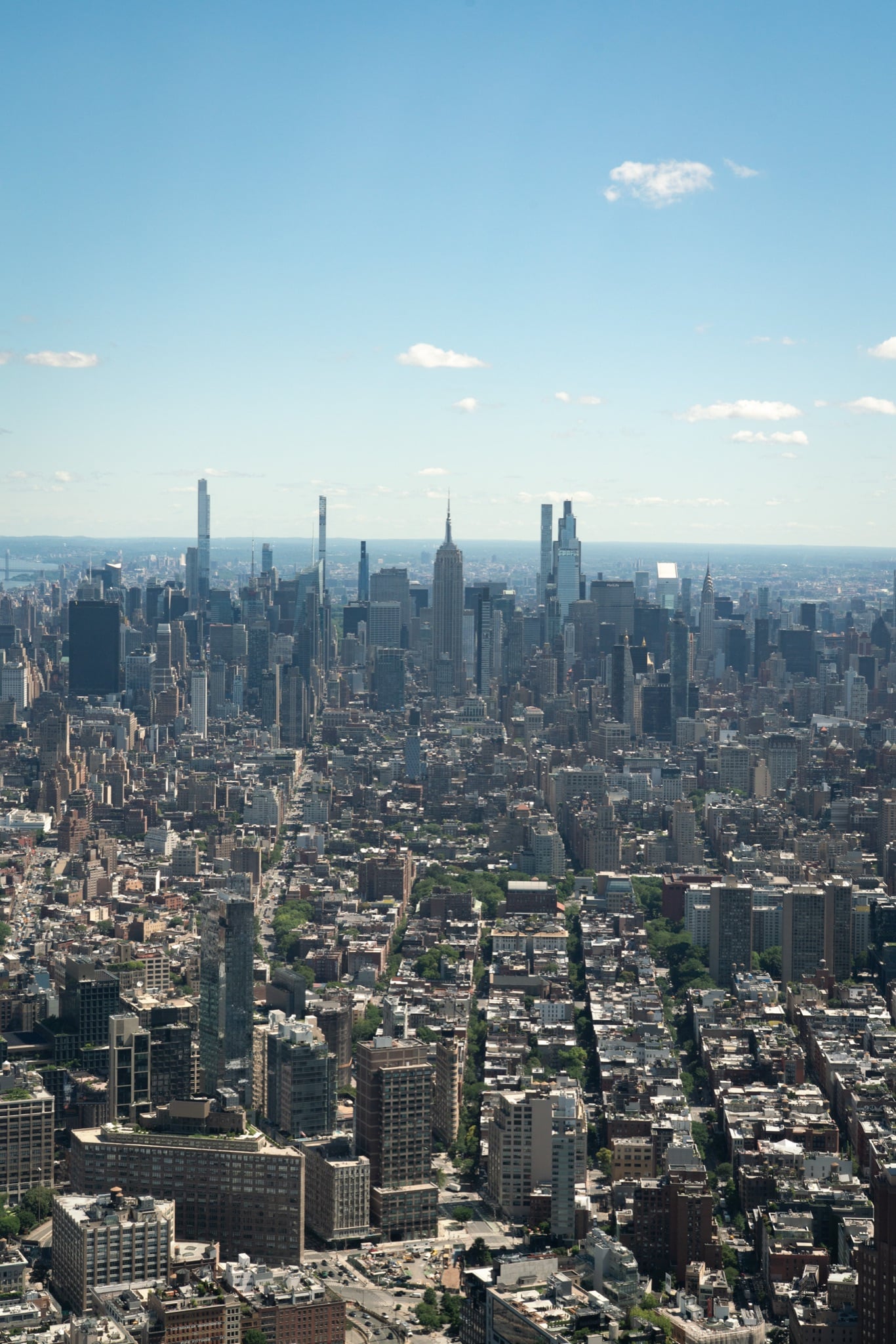 The Manhattan skyline rising in a vertical sweep