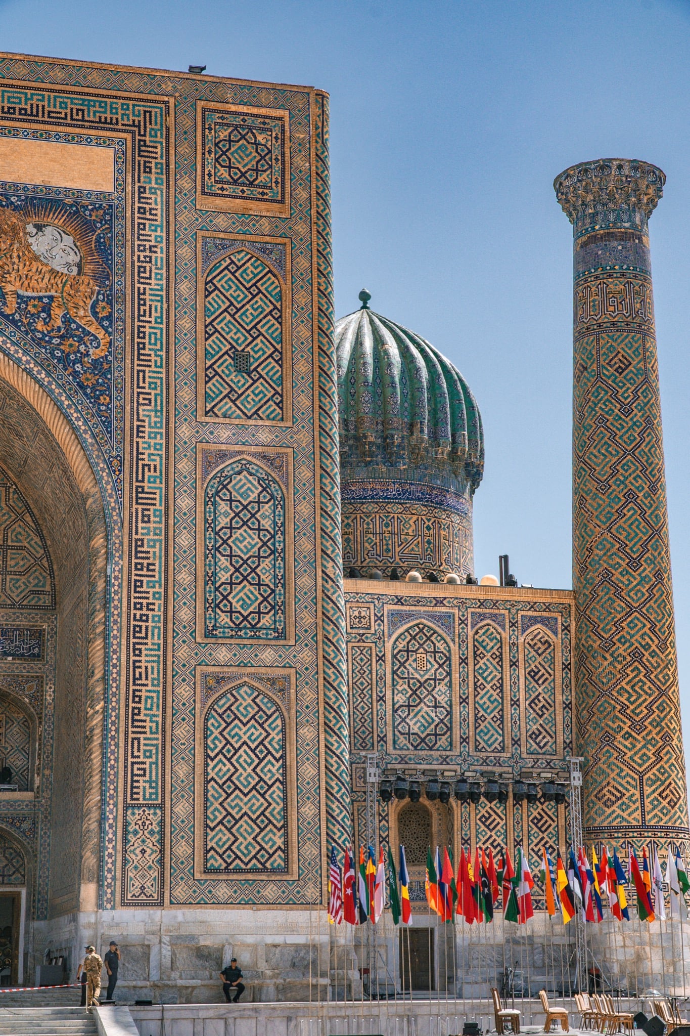 Turquoise mosaics rising on a Registan Square facade, Samarkand